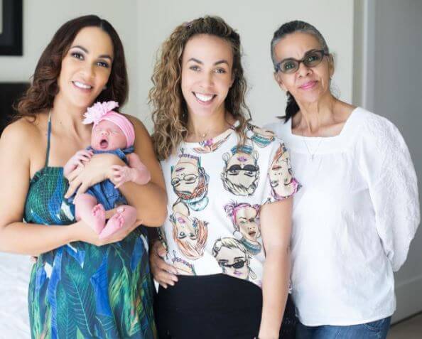 Jodi Stewart and her newborn baby, along with her mother and sister.